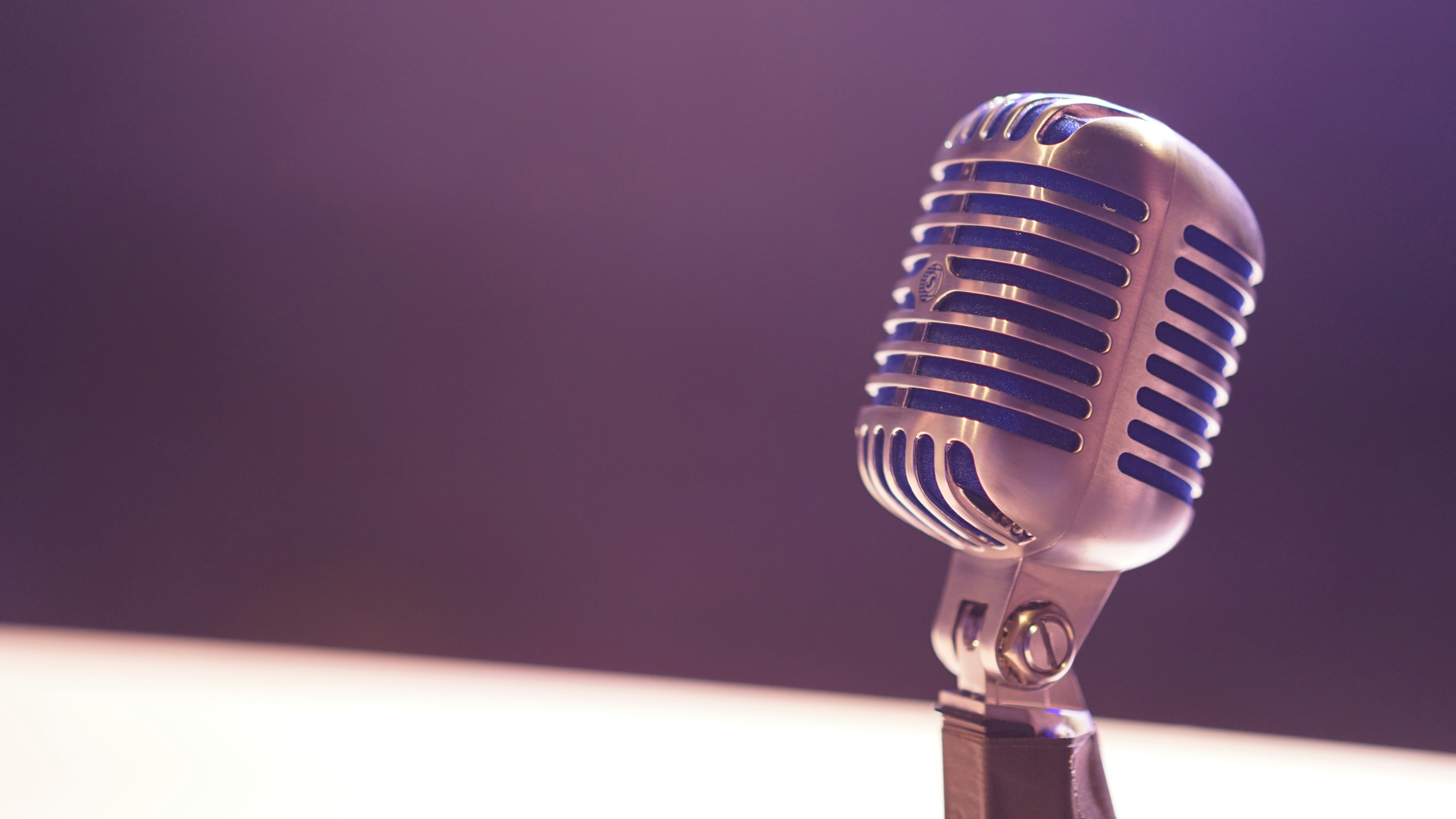 Condenser microphone representing lecture recording and AI transcription technology