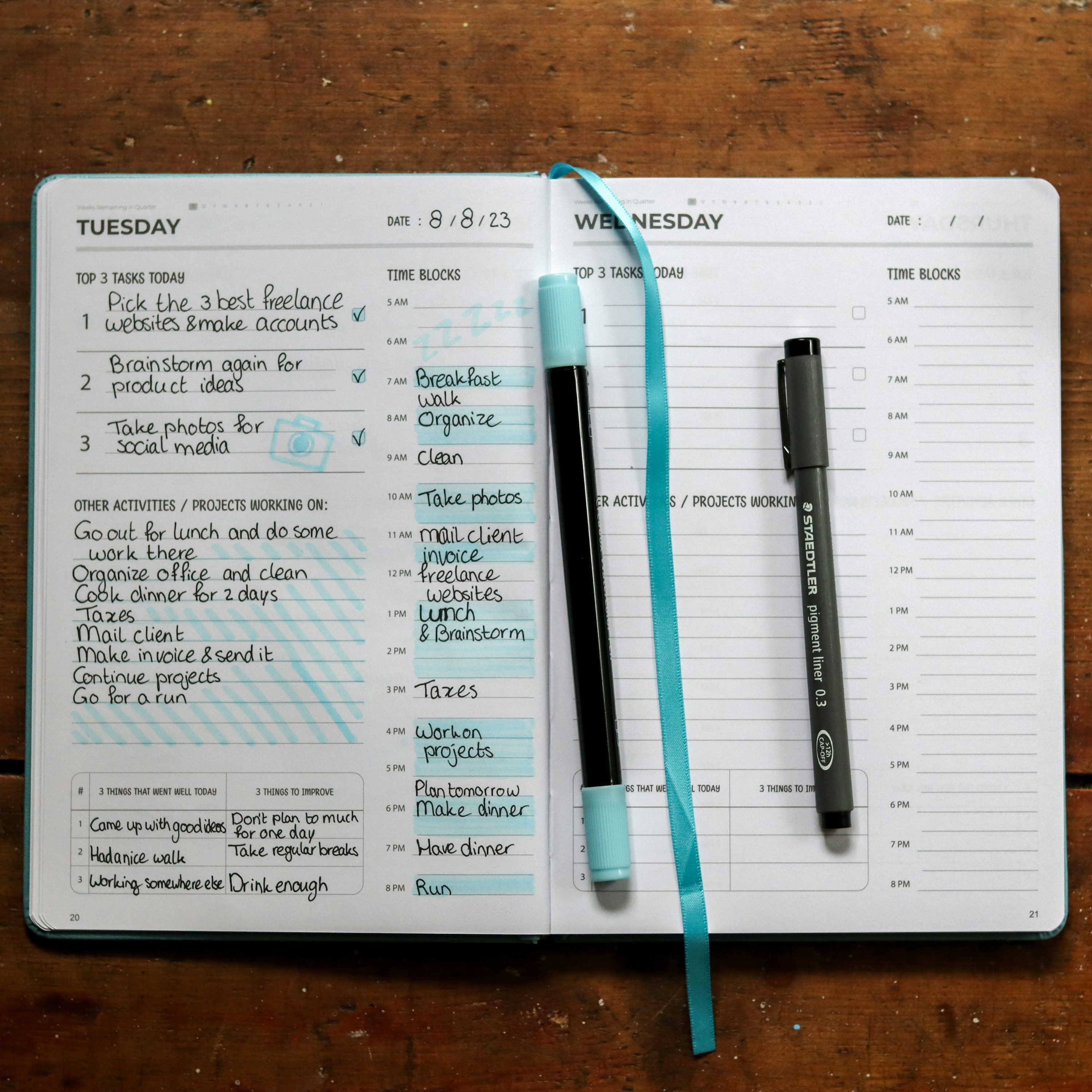 Notepad with a simple study plan and pen on a desk