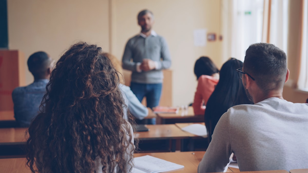 Teacher instructing students in a classroom