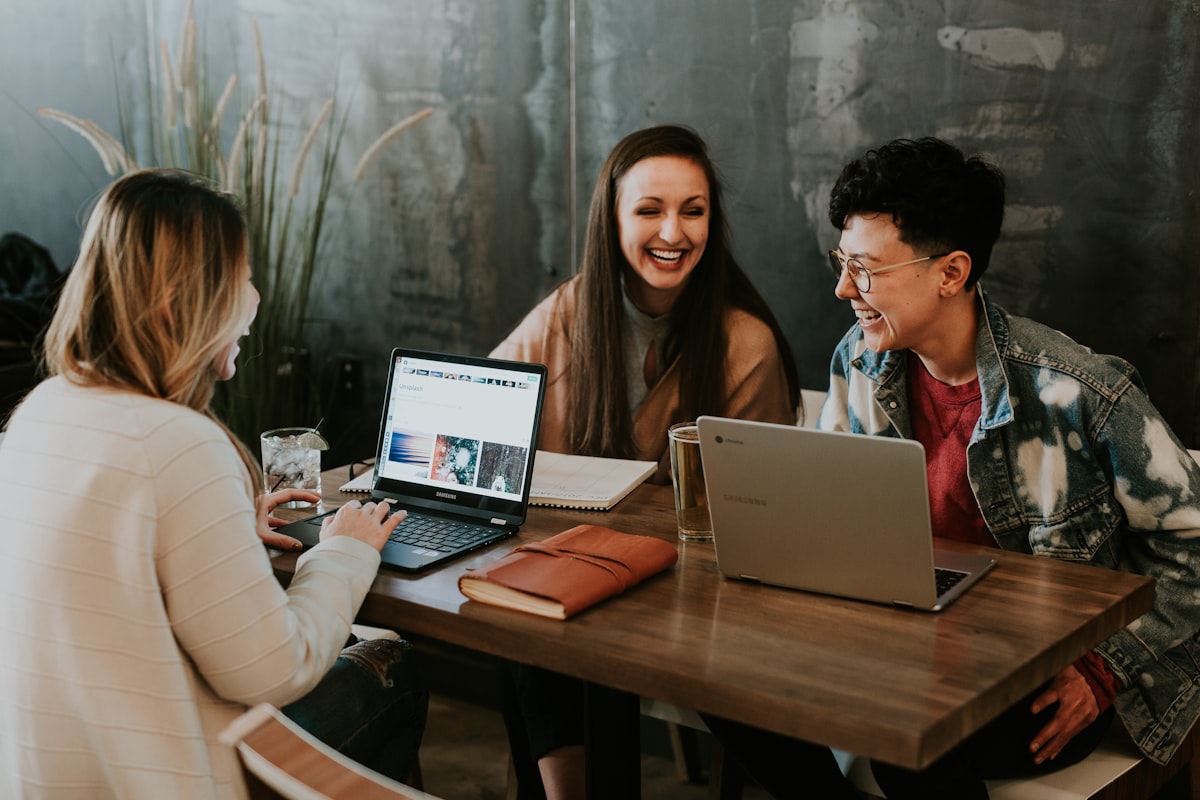 People collaborating and studying together at a table