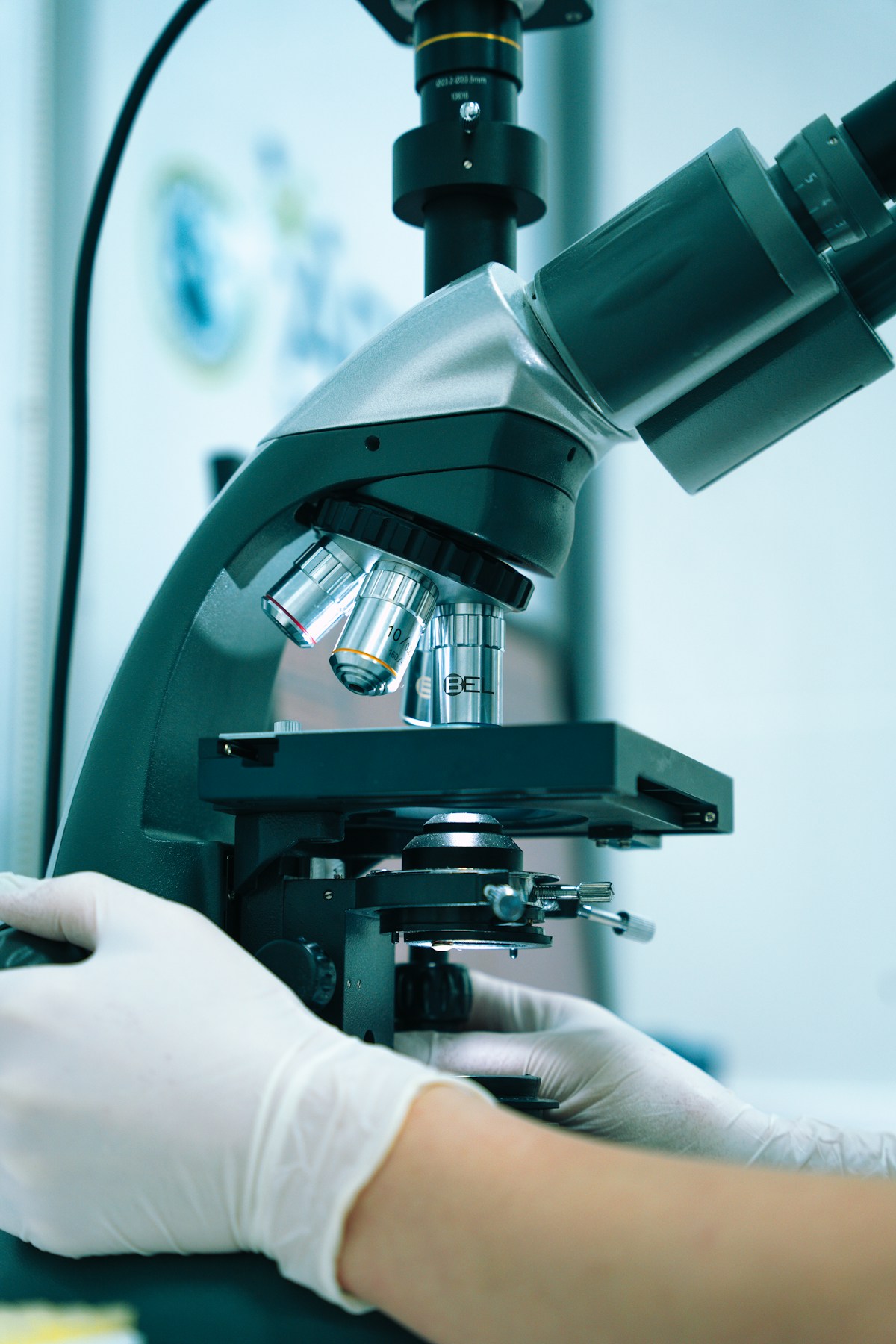 Microscope and lab equipment on a bench during a science laboratory session