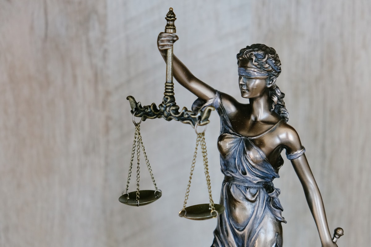 Law books and legal documents on a desk for case study