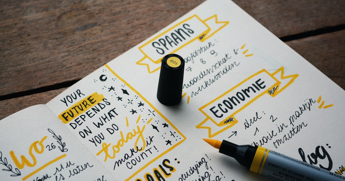 Timer next to a notebook and pen for a focused 5-minute study session