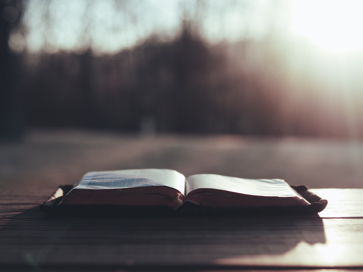 Open Bible on a wooden table