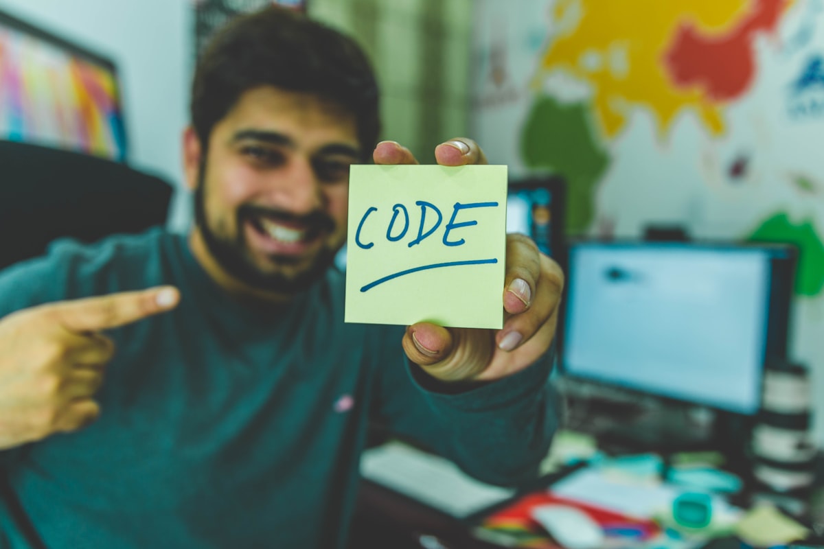 Software developer preparing for technical interview with code on screen