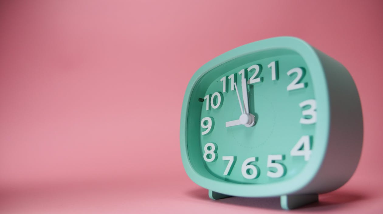 Close-up of an alarm clock showing the time