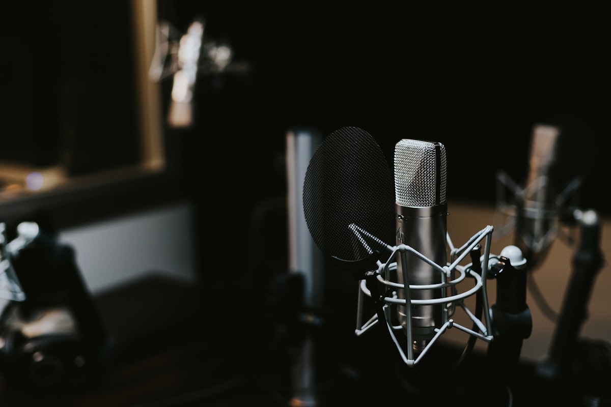 Student recording voice notes on a smartphone for study transcription